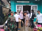 Aksi Cepat Babinsa Serka Sunarya Selamatkan Warga dari Banjir Bandar Lampung